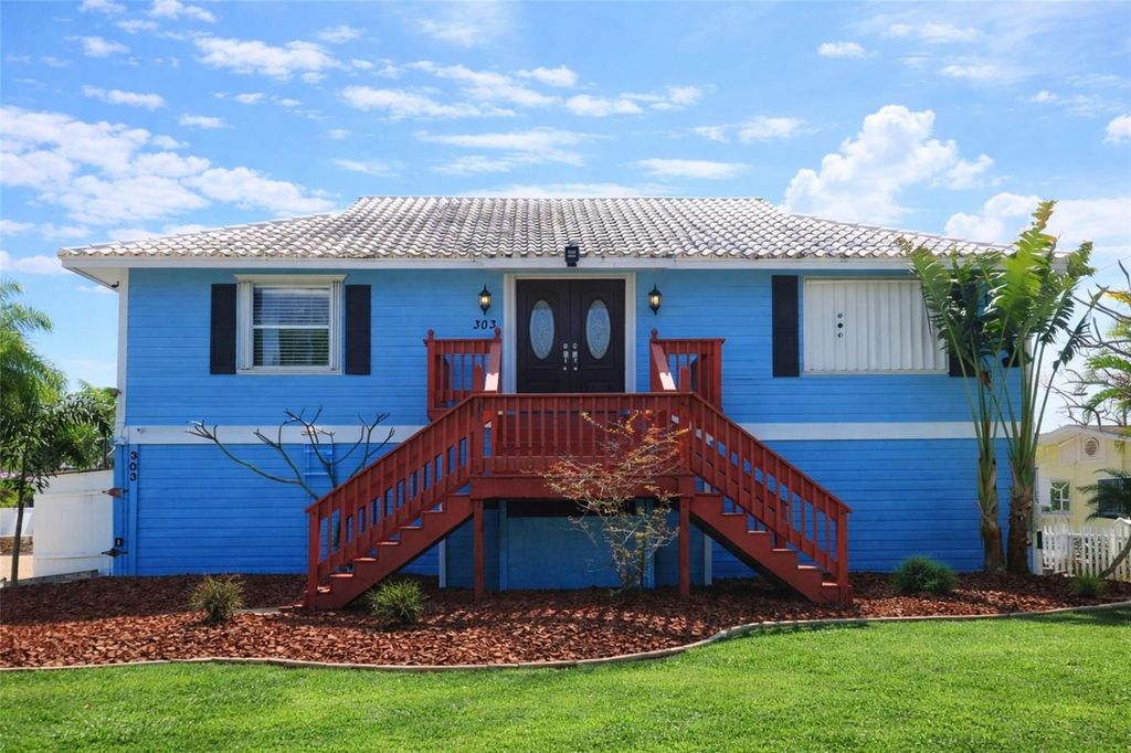 Photo of 303 Lagoon Drive, Palm Harbor, FL 34683 (MLS # TB8475281)