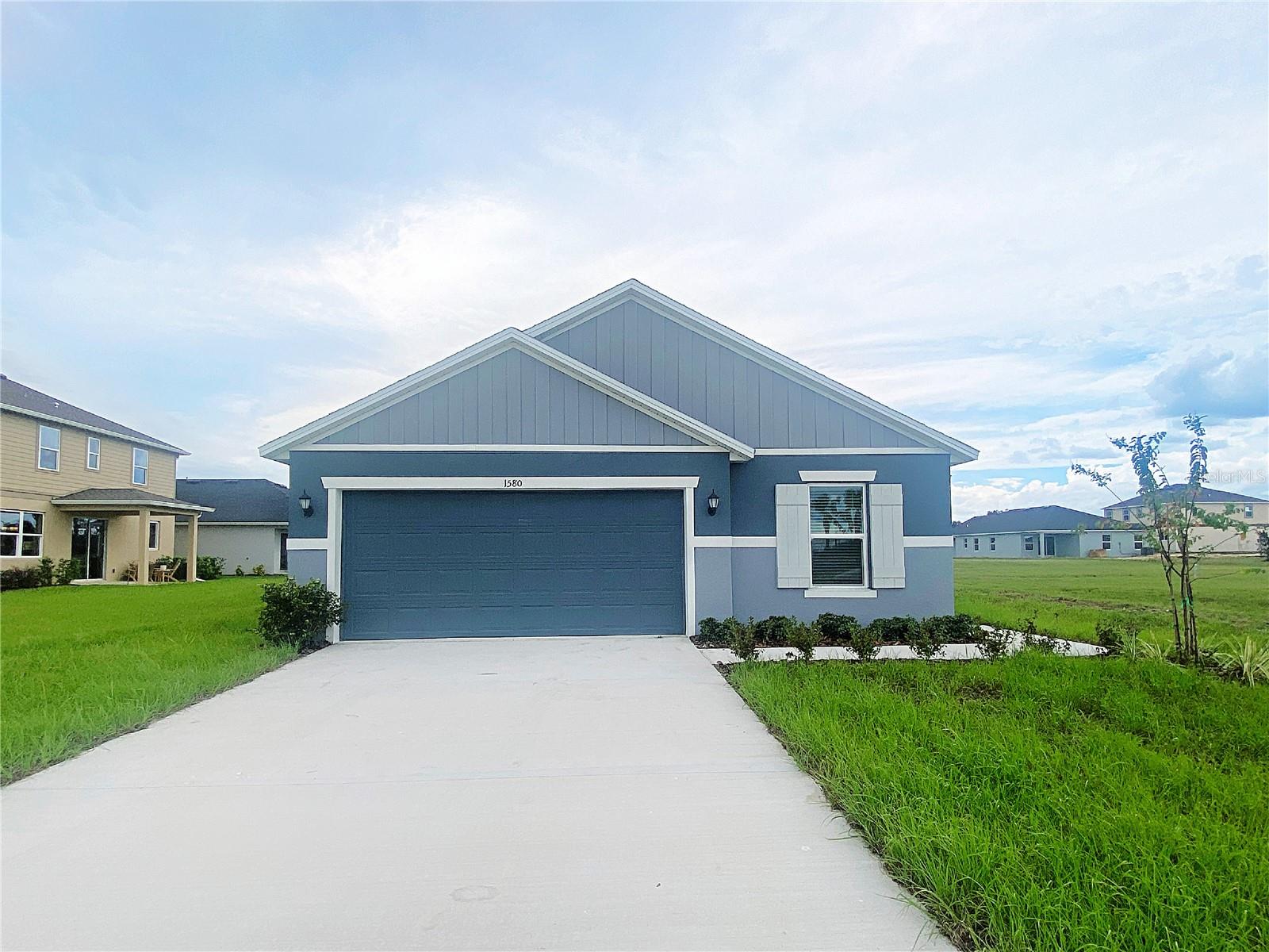 Brand New 4-Bedroom Home in Lake Wales with LAWN CARE INCLUDED! Welcome to Robin’s Run, one of Lake Wales’ newest communities! This stunning brand new 4-bedroom, 2-bath home offers modern living with an open floor plan and thoughtful design throughout. The heart of the home is the spacious kitchen, featuring a large island, stone countertops, stainless steel appliance package, closet pantry, and abundant cabinet and counter space. The kitchen flows seamlessly into the great room/dining room combo, creating the perfect setting for entertaining or everyday living. Sliding glass doors open to the rear lanai, providing a great spot to relax and enjoy Florida living. The split-bedroom layout offers privacy, with the master suite tucked away on one side of the home. The suite includes a walk-in closet, dual sinks, walk-in shower, and linen closet. On the opposite side, you’ll find three additional bedrooms and a guest bath with an added vanity space. Additional highlights include ceramic tile flooring in the main living areas with carpet in the bedrooms, ceiling fans throughout, new sod with an irrigation system, and a two-car garage. The home is also ideally situated next to the community mini-park, offering a convenient and enjoyable outdoor space nearby. Conveniently located with easy access to Hwy 27, Hwy 17, and State Road 60, you’ll find shopping, dining, and everyday amenities just minutes away. This beautiful new home offers both comfort and convenience—don’t miss the opportunity to make it yours! Sorry, NO smoking/vaping and NO pets permitted.