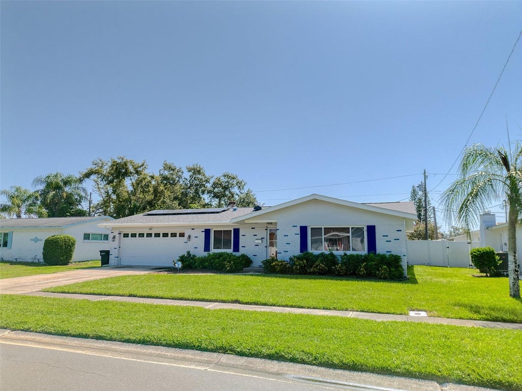 Photo of 1837 Princeton Dr, Clearwater, FL 33765 (MLS # TB8552160)