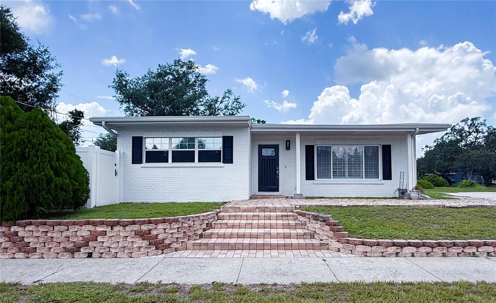 Dream Location in South Tampa with easy access to Shopping, Dining, and Entertainment! 2 Bedroom, 2 Bathroom Home on a large Corner Lot in the North Bon Air Community. Attractive remodel with nice updates and finishes including Plantation Shutters throughout. There is no carpet in this home with Wood Plank Ceramic Tile installed in all the main spaces. The Vaulted Ceiling, Multiple Windows, and Gray Paint make the Open Floor Plan Kitchen and Living Room feel light and Bright. The elegant Kitchen has Stainless Steel Appliances, a Double Basin Kitchen Sink, tall espresso Wood Cabinetry with Crown Molding, Stone Countertops, and an oversized Island perfect for casual dining. The Master Bedroom has a Ceiling Fan with En-suite Bathroom. The stylish Master Bathroom has a Walk-in Shower with Decorative Tile Work and a Single Vanity with Stone Countertop. The 2nd Bedroom is equally nice with a large Double Closet and Ceiling Fan. The Common Bathroom is finished similar to the Master Bathroom with a Walk-in Shower and Stone Countertop. The Laundry Room has a Washer, Dryer, and plenty of Cabinetry. The oversized Backyard is Fully Fenced and has a Maintenance-free Lawn. The detached structure in the Backyard has an Outside Kitchen/Grilling Area and extra Storage. Perfect for hosting guests and enjoying the outside year-round. Plenty of Off-Street Parking available on the Circular Driveway. There is a one-time $150 Administration Fee and a $75 Application Fee for each applicant 18 years or older. Applicants should have a minimum 600 credit score, Gross Monthly Income of at least 2.5 times the Monthly Rent, and stable Rental History (no Evictions or Tenant Collections).