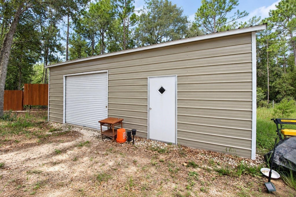 Photo of 152 Piper Drive, Hawthorne, FL 32640 (MLS # GC543633)