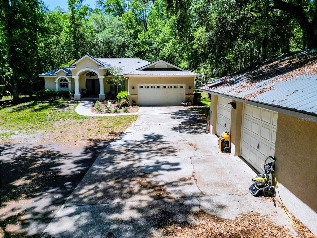 Photo of 5215 Cedar Lane, Brooksville, FL 34601 (MLS # TB8501625)