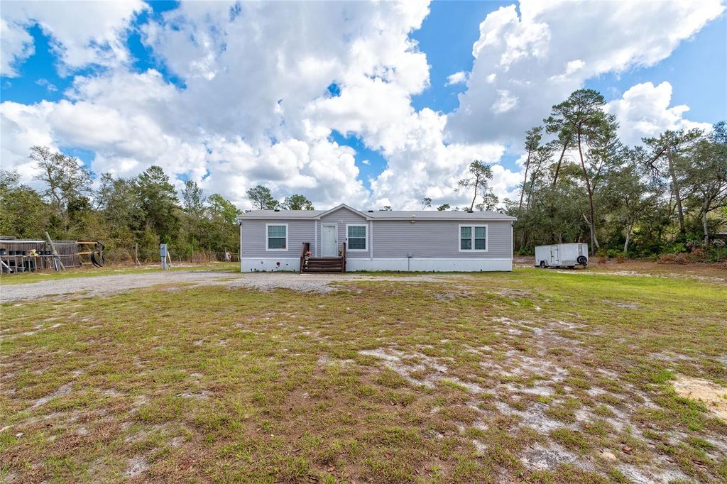 Photo of 42300 Fonseca Lane, Deland, FL 32720 (MLS # O6382810)