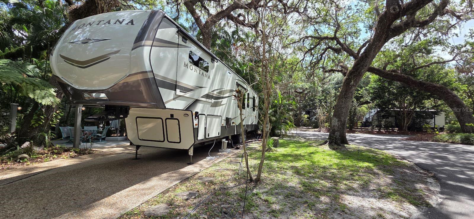 Looking for a Luxury RV Lot in Central FL? WELCOME HOME to RIVER RANCH RV RESORT, Florida’s Luxury RV Resort with access to Lake Kissimmee! This privately owned RV lot is located in Phase 3 and sits on a very large Corner Lot just steps from laundry, pool, pickleball courts, shuffleboard, bathhouse and more! This Lot offers privacy, lush foliage, dedicated golf cart/vehicle parking, a spacious grassy area for your fur-babies and is big rig friendly! This lot has an extended concrete offering a COZY firepit area, an outdoor kitchen space, a shed, and a walkway to golf cart/vehicle parking! The privacy is AMAZING on this property, yet it is located in the HEART of Phase 3 and all of the amenities! This lot offers shade and sun - the perfect combination! River Ranch RV Resort is perfect for weekend vacations, family camping, seasonal living! River Ranch RV Resort offers beautiful landscaping and privately owned RV lots. There are many amenities such as Pools, Tennis, Pickle Ball, Clubhouse, Social Events, Billiards, Poker Room and more! WHY BUY AT RIVER RANCH? Turnkey Rental Income Opportunity, High-Demand Vacation Destination, Privately Owned RV Lots – Perfect for weekend getaways or full-time living!
Low Maintenance Investment – HOA covers water, sewer, trash, cable & more! River Ranch is more than just a Resort - It is a Lifestyle! Live Rodeo Every Saturday Night – Experience the Wild West! Saloon Fun – Live music, DJs, line dancing & family-friendly vibes! Adventure Park – Airboat rides, mechanical bull, mini golf, arcade & more! Resort Amenities – Pools, tennis, pickleball, poker room & social events! Dining on Property – BBQ, steakhouse, pizza, Starbucks & ice cream! -RV has been sold, no longer being offered as a package. LOT ONLY at this price!