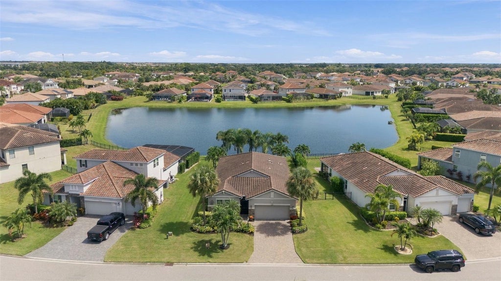 Photo of 13316 Saw Palm Creek Trail, Bradenton, FL 34211 (MLS # A4708617)