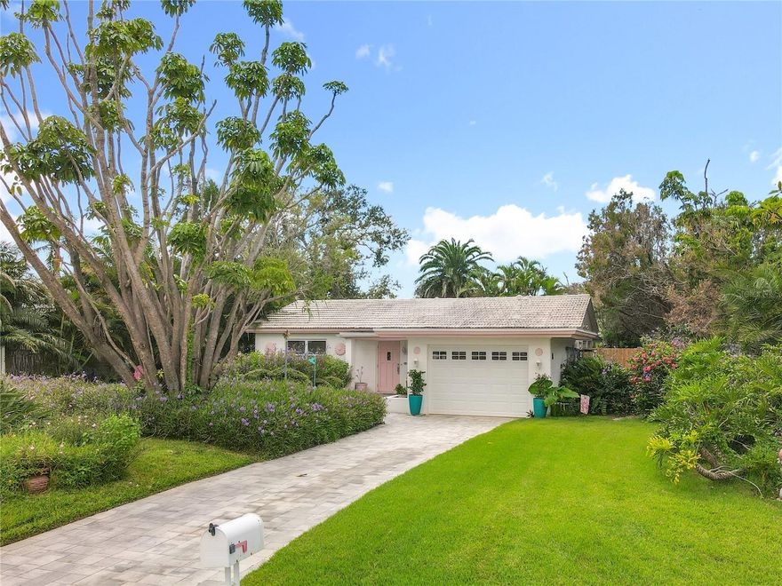 Welcome to your fully renovated coastal retreat in the heart of Treasure Island! This beautifully updated 2-bedroom, 2-bath home sits on nearly a quarter-acre of lush, mature landscaping, offering both privacy and charm. The open-concept living spaces are filled with natural light and designed for modern living, while the sleek, renovated kitchen and stylish baths showcase contemporary finishes. Additional features include a versatile sunroom that adds extra living space, a convenient laundry room, and an oversized one-car garage with a brand-new hurricane-rated door. Step outside to your private backyard oasis featuring a sparkling pool, tropical landscaping, and plenty of room for entertaining. Set within the most-desired neighborhood of Paradise Island, and just moments from the Intracoastal and sandy Gulf beaches.