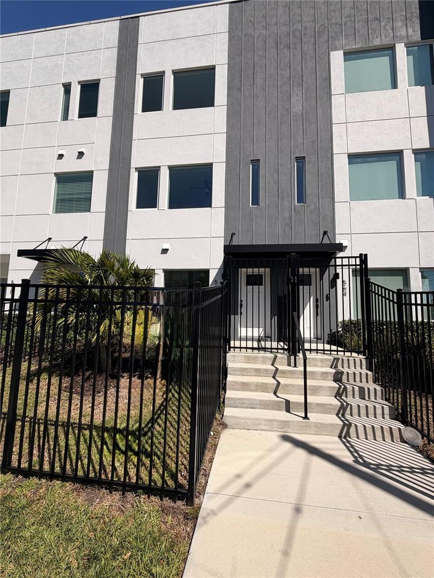 **SELL OUT INCENTIVES NOW OFFERED FOR A LIMITED TIME WITH LIMITED INVENTORY! SELLER CONTRIBUTING UP TO 3% BUYER COSTS AND UPGRADED EPOXY GARAGE FLOORS...HURRY, ONLY A FEW HOMES REMAIN!** Experience Elevated Urban Living at The Franklin model within Innovation Townhomes. Discover the epitome of modern sophistication in one of Downtown St. Petersburg’s newest gated communities. This stunning floor plan redefines contemporary townhome living, offering 2 Bedrooms, 2.5 baths, a 1-car EV-ready garage, and a spacious rooftop terrace perfect for city views and sunset gatherings. Thoughtfully designed for both comfort and functionality, the main floor features a private en-suite bedroom, ideal for guests or a home office. Upstairs, you'll find an expansive owner’s suite for ultimate relaxation. The heart of the home is a sleek, open-concept kitchen boasting flat-panel, soft-close cabinetry, a striking herringbone tile backsplash, premium BOSCH appliance package, including a gas range, and counter-depth refrigerator. Elegant 3cm quartz countertops with a generous 8ft. island, great for effortless entertaining. Enhancing your rooftop experience is a stylish wet bar with a wine fridge… perfect for morning coffee rituals or evening drinks under the stars. For added convenience, a full-size stackable washer and dryer are thoughtfully positioned near the owner’s suite. Welcome to elevated style, smart design, and the newest of St. Petersburg’s vibrant urban lifestyle.