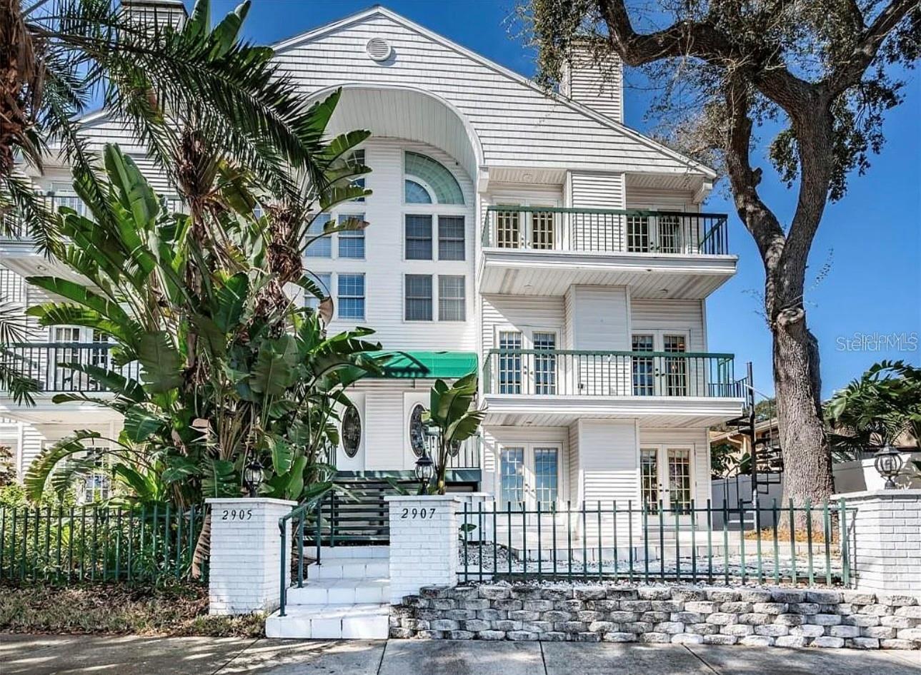 This luxurious three-story waterfront condo in South Tampa is nestled in a serene location along the renowned Bayshore Boulevard. The open floor plan creates a bright and spacious space complemented by a wood-burning fireplace. The kitchen features stainless-steel appliances, quartz countertops, a tile backsplash, a large center island, white cabinetry, pendant lighting, and a convenient wine rack. The primary bedroom located on the third floor offers a large walk-in closet and a private balcony that offers partial water views. Stovall Commons is an intimate 6-unit community overlooking Bayshore with a private pool and surrounded by everything you want in South Tampa!