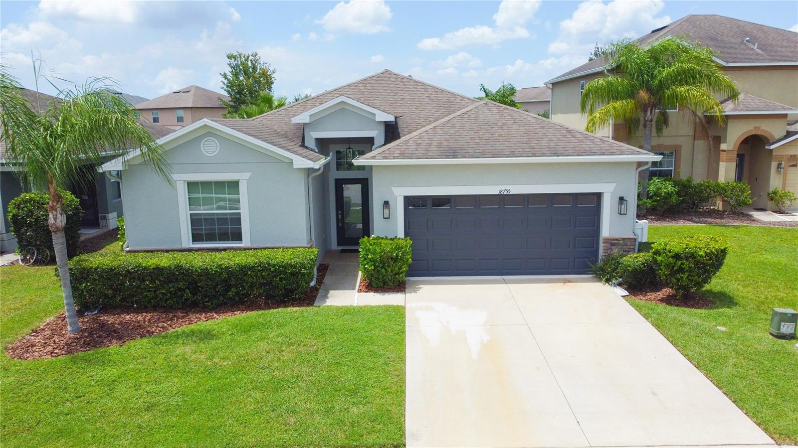 Welcome to 18755 Burndall Court — a modern retreat tucked away on a quiet cul-de-sac in the coveted Concord Station community of Land O’ Lakes.
This meticulously maintained 4-bedroom, 3-bathroom pool home blends contemporary elegance with everyday comfort across more than 2,000 square feet of light-filled, open-concept living space.
At the heart of the home is a fully updated kitchen featuring quartz countertops, stainless steel appliances, soft gray Shaker cabinetry, and a spacious island with seating — perfect for both casual meals and entertaining. High ceilings, expansive windows, and refined finishes add to the home’s upscale feel, while custom wood trim accents bring warmth and personality.
The split-bedroom layout offers privacy, with a spacious primary suite featuring a spa-style en-suite with dual vanities, modern top-of-the-line Kohler fixtures, a soaking tub, walk-in shower, and his and hers separate large walk-in closets. All bathrooms and the kitchen have been thoughtfully updated for a cohesive modern design.
Step outside to your own private backyard retreat — featuring a solar-heated pool, elegant paver patio, and low-maintenance PVC privacy fencing, creating the ideal space for entertaining or relaxing under the Florida sky.
Additional features include a finished 2-car garage, full-size interior laundry room, and lush landscaping. Located in a family-friendly neighborhood with top-rated schools, this home also includes access to Concord Station’s premium amenities: clubhouse, resort-style pool, gym, courts, playgrounds, splash pad, and nature trails.
Enjoy the perfect mix of style, comfort, and convenience — just minutes from the Suncoast Parkway, shopping, dining, and all that Land O’ Lakes has to offer.
Buyer to verify all measurements.