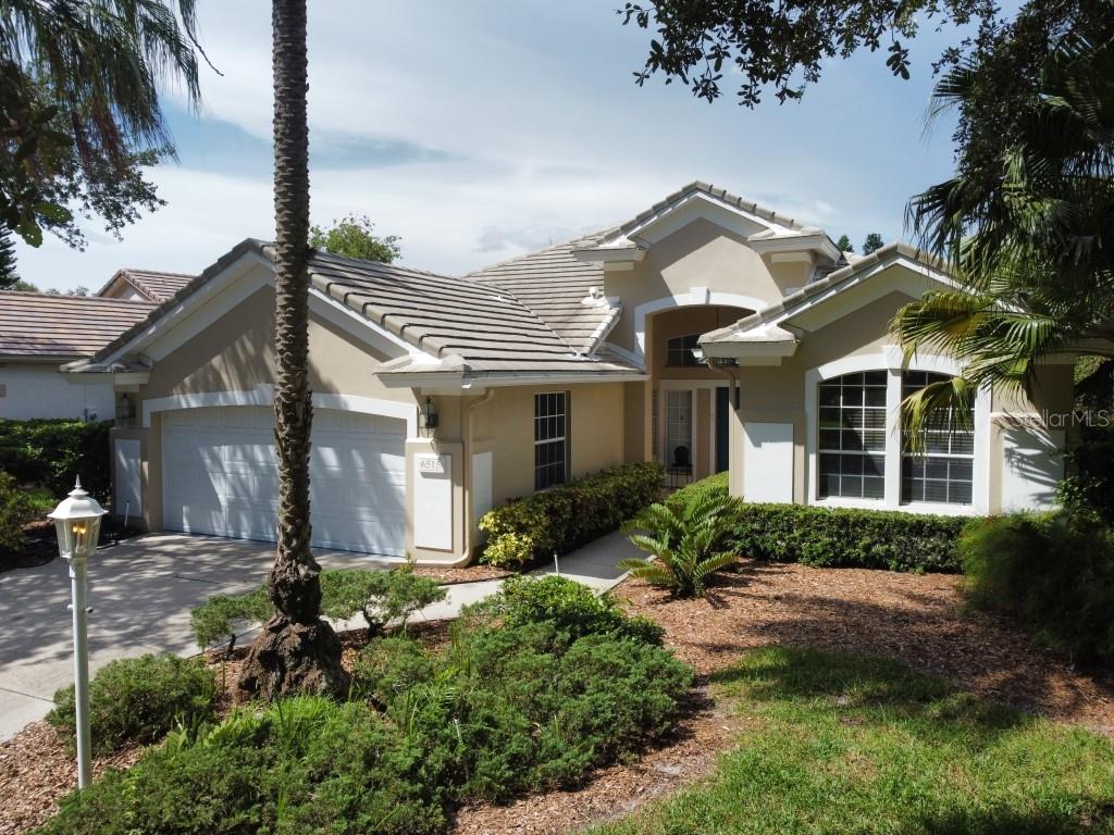 You are buying more than a house - you are buying a luxurious lifestyle in a gated, well-established community in the heart of Sarasota, where you will always feel welcome and at home! Nestled in the heart of the UPCC, this house will be your oasis for a balanced living of lively social events, quiet evening strolls, golfing/tennis, and amazing Florida beach sunsets. This house has open-space, high ceiling living. You'll be welcomed by a large & airy living room, adjacent dining room and gorgeous views of the pool and the lake. The kitchen has generous counter and cabinet space, as well as a spacious dining nook with a built-in bench and panoramic windows. The primary bedroom opens up to beautiful views of the back yard and will spoil you with an oversized bathroom and closet. The other 2 rooms feature ample space, storage and an adjacent bathroom. The two-car garage is facing a little garden circle, which adds to the tranquil setting of the house. This private community provides a perfect setting for your optimal life-style: you can enjoy tennis, golf, pickle-ball, gym and the most picturesque community in Sarasota and you can also conveniently access shopping, restaurants, schools, airport and the freeway. What's more, this house is an easy drive to many of the beautiful beaches Florida has to offer, including Lido and Siesta. Additionally, there is a large heated community pool & jet tub to do laps in, and the UPCC club house regularly hosts lively events and concerts for your entertainment. Come check it out - you will not want to leave! Owner has a real estate license in CA.