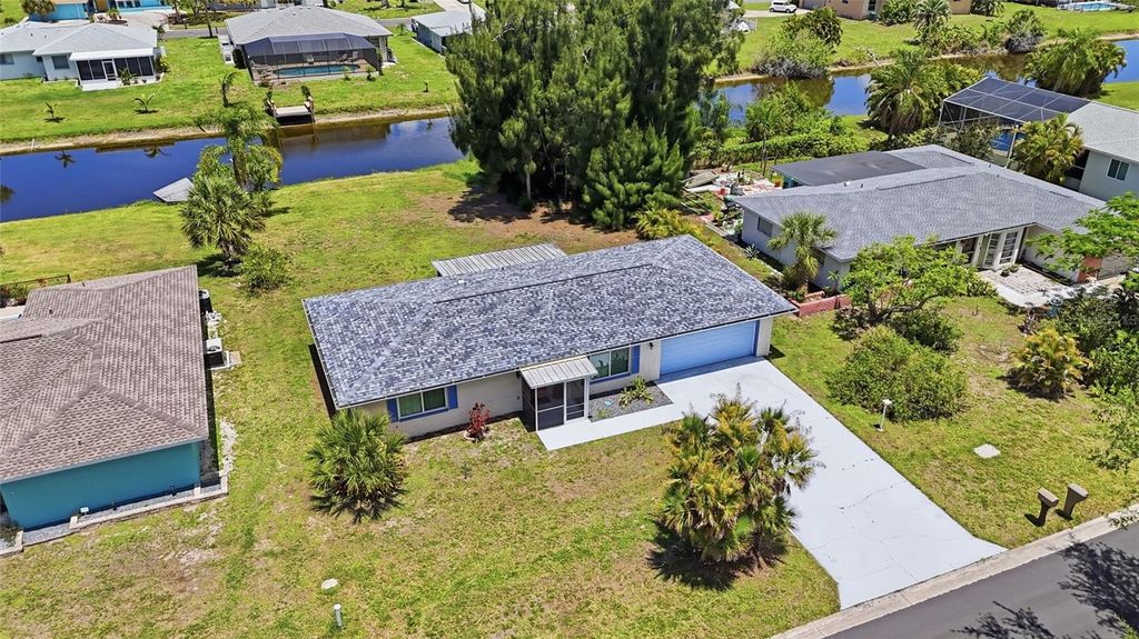 Photo of 52 Annapolis Lane, Rotonda West, FL 33947 (MLS # O6410119)