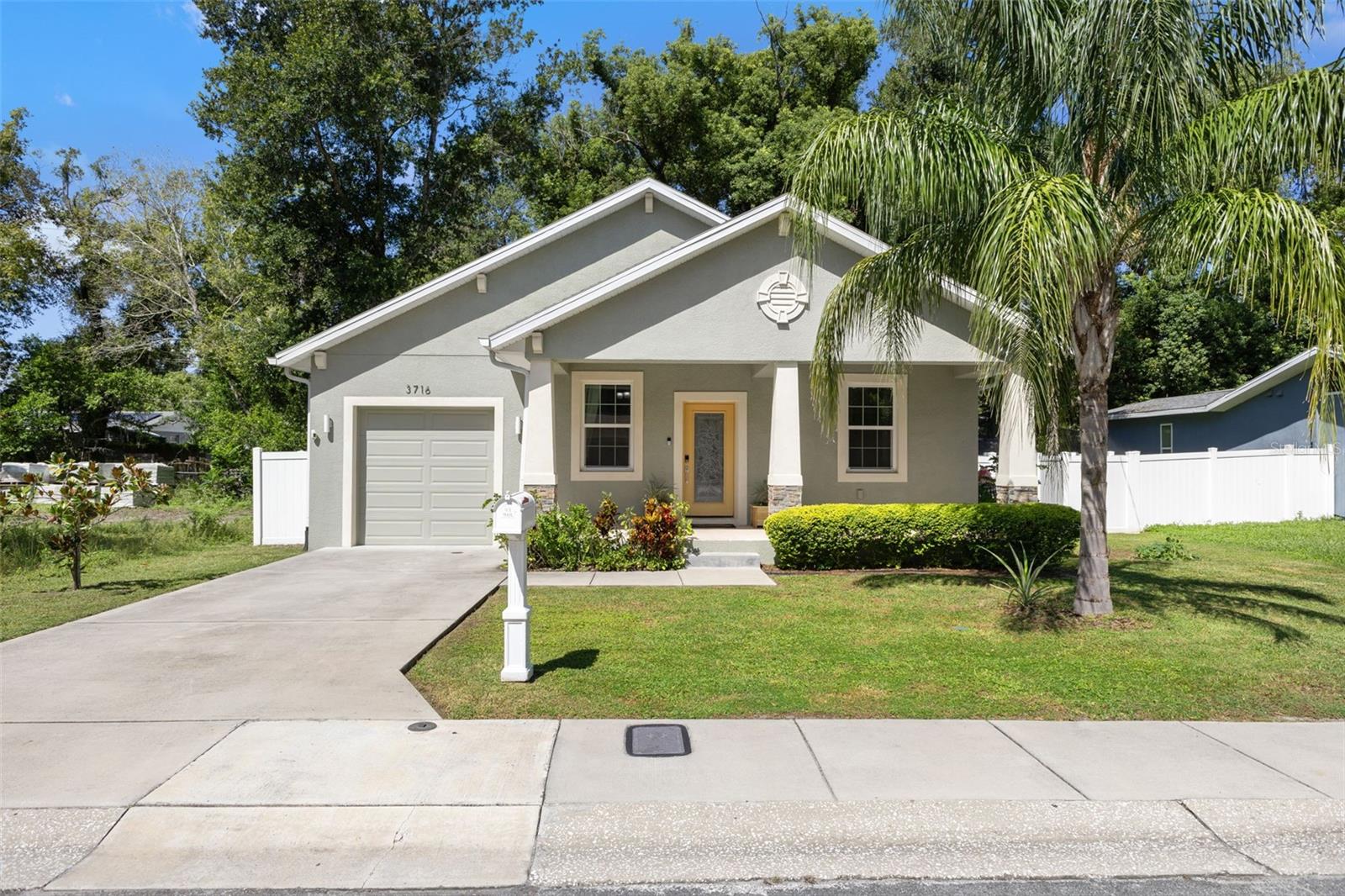 Make this newer build your home, or enjoy the documented $40K+ in revenue that this turnkey Airbnb has consistently produced! Equipped with smart home technology, this 4/2, completed in 2021 and located on a quiet street, provides plenty of space to spread out and relax, as well as an open floorplan great for entertaining! Enter from the large front porch or garage into the living room, and then proceed into the kitchen, where you will find a large, counter height breakfast bar with enough seating for four. The kitchen would complement any home chef, with lots of granite countertops, beveled subway tile backsplash, stainless steel appliances, tall, soft close white shaker cabinets, and a pantry. The kitchen is open to flex space, which is currently being used as the dining area, and presents another option for casual living. A wide slider opens to the lanai at the rear of the home, offering a nice shady spot to enjoy the outdoors. The large primary suite is off on its own, providing privacy as well as lots of storage space with a 6' x 7' walk-in closet, and an ensuite bathroom with a shower stall and frameless glass shower enclosure. The remaining three bedrooms are all of ample size with nice sized closets. Water and pet proof luxury vinyl plank flooring is installed in all living spaces, with carpeting in the bedrooms. Both bathrooms feature unique shower surrounds with a touch of bling and something to look at, and large, rectangle ceramic tile flooring. The smart home features include the front door lock, garage door opener, irrigation system, Ring alarm system (doorbell + 3 cameras, and alarm contacts on all doors and windows), and a Nest thermostat. Every room is wired for wifi, and the kitchen includes an outlet with USB ports. Built of concrete block construction, impact windows, and NOT located in a flood zone, this is the perfect home to hunker down in during the hurricane season. A tankless hot water heater and epoxy coated garage floor are the icing on the cake! Centrally situated, and just minutes from Historic Ybor, downtown Tampa, Channelside, Tampa Armature Works, and all of the major highways (I-4 & I-275), you cannot beat the location! Book your showing today!!