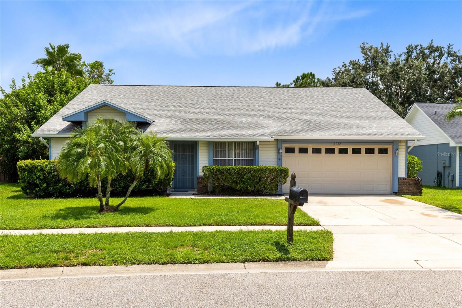 Welcome to 2023 Gamboge Dr, a beautifully updated Orlando home offering comfort, privacy, and an ideal location. Recent upgrades include a new roof (2024), newer A/C compressor and condenser (2022), water heater (2023), refrigerator (2023), garbage disposal (2022), digital thermostat, sprinkler system, and a high-wind rated garage door. Fresh carpet in the family room (2024) adds warmth, while thoughtful updates throughout provide peace of mind. Alarm system is installed but not monitored. Inside, the home features a formal living room, an open kitchen with tile flooring and a walk-in pantry, and a spacious family room with vaulted ceilings and a cozy fireplace. The split floor plan ensures privacy for the bedrooms, while attic access and a two-car garage add valuable storage. Out back, you’ll love the expansive fenced backyard overlooking a peaceful pond and conservation area—offering both space and tranquility. A large screened porch with a tiki bar creates the perfect spot for gatherings or quiet evenings outdoors. Perfectly situated near shopping, dining, and major roadways, this home provides easy access to all that Orlando has to offer, while still feeling like a private retreat. With its large backyard, serene setting, and convenient location, 2023 Gamboge Dr is a must-see.