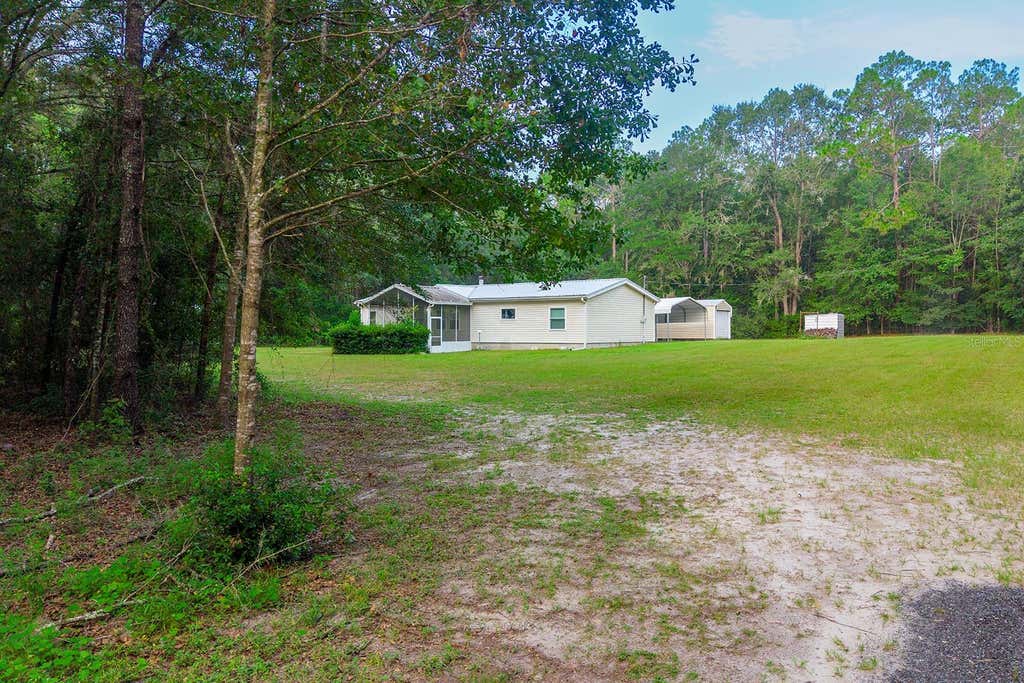 Photo of 350 SE Bald Eagle Loop, Lake City, FL 32025 (MLS # GC542350)