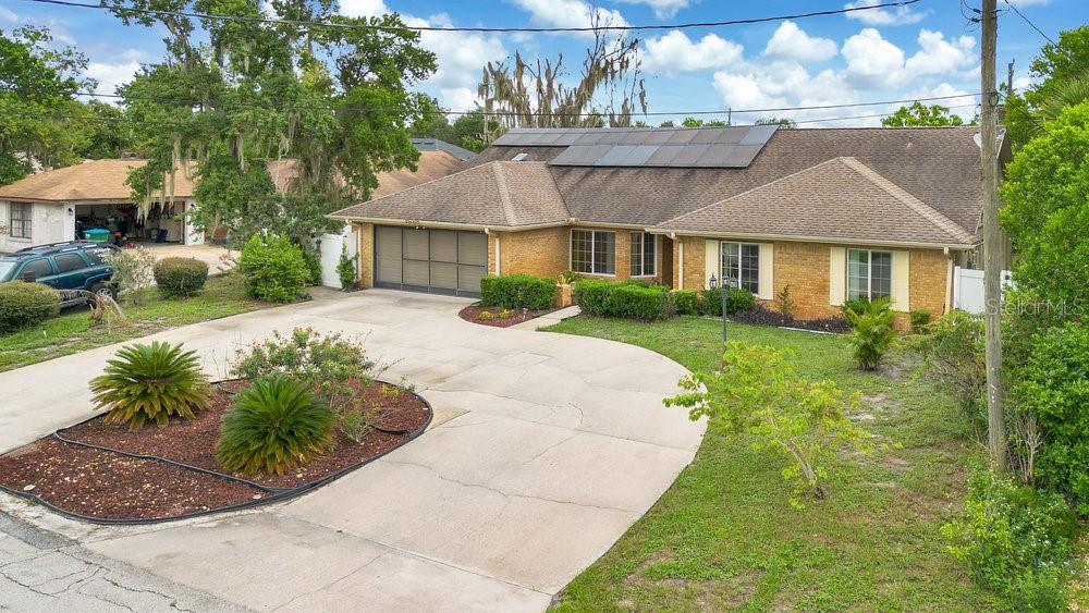 Tired of today’s sky-high interest rates? LOCK IN A 2.875% ASSUMABLE MORTGAGE on your dream home in sunny Central Florida. This home offers over 2,000 sq ft of living space, with PAID IN-FULL SOLAR PANELS, DOUBLE-PANE INSULATED WINDOWS, NEW MICROWAVE, STOVE, DISHWASHER, WASHING MACHINE, and ADDED ATTIC INSULATION - giving you ultimate energy efficiency and LOW MONTHLY LIVING COSTS!
Step inside and enjoy the bright, open floorplan featuring vaulted ceilings, engineered hardwood floors, and multiple living areas that make entertaining and relaxing effortless.
Love Florida living? Step out to the 29’x19’ screened-in porch, ideal for morning coffee or evening gatherings. The fenced backyard includes a storage shed and garden with flagpole, while the 2-car garage with retractable screen and ceiling fan makes for the perfect hobby or workout space. A circular driveway enhances the curb appeal and provides extra parking for guests.
With NO HOA, you’ll enjoy freedom and flexibility. And with the assumable 2.875% mortgage, you can own this home with payments hundreds less per month than today’s typical rates—plus continued savings from solar and insulation upgrades.
Conveniently located near I-4, schools, parks, shopping, and Florida’s beaches, this home delivers the lifestyle you’ve been searching for.
Don’t miss this chance to live beautifully and affordably. Schedule your showing today!