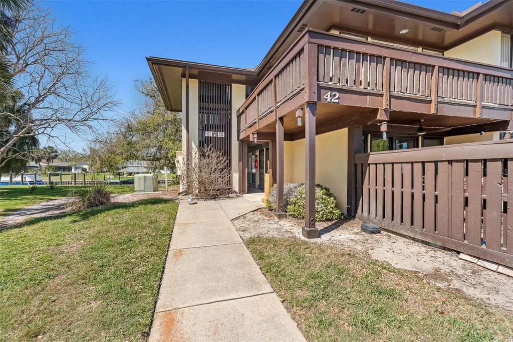 Photo of 42 Club House Drive #101, Palm Coast, FL 32137 (MLS # FC316984)