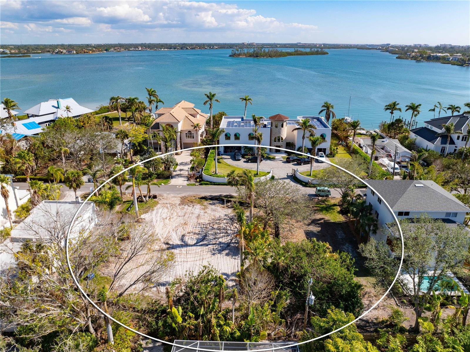 Development opportunity! Lot 17 is the western most lot of the three adjacent parcels that are for sale in Siesta Key’s private enclave of Roberts Point. As one of the most affordably priced buildable lots on Siesta Key, this is your chance to make your dream island life a reality. Known for its laid-back island ambience, you will find updated cottages overflowing with old Florida charm comfortably co-existing with impressive, modern estates carefully crafted to harmonize with their coastal surroundings. Lot 17 measures approximately 6,250 sq ft. Fulfill your island dream, constructing your idyllic custom oasis or build your dream estate spanning three lots. Note that renderings of potential floor plans to fit a single lot are in the images of the listing. Surround yourself with gulf coast attractions like the world-famous Crescent Beach, the vibrant arts scene of downtown Sarasota, and a plethora of recreational activities from golf to wildlife watching. Siesta Key is the envy of the gulf coast, attracting everyone from around the world to its beautiful beaches, vibrant island culture and opportunities for adventure. This is an enticing option for a homeowner, investor, builder or seasonal resident.