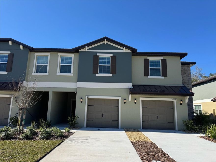 This two-story townhome showcases a contemporary open design among the first-floor kitchen, living room and dining room to promote seamless transitions between spaces. Nearby is a covered patio for outdoor relaxation. Upstairs caters to intimate spaces with a versatile loft area, two secondary bedrooms with secondary bathroom, along with the private owner’s suite complemented by an oversized walk-in closet. Welcome to Angeline, a new 6,200+ acre master-planned community in Land O' Lakes, FL, perfect for first-time homebuyers and families at every stage in life. Endless days basking in the sun and a wealth of outdoor adventures await for residents living at Angeline, thanks to 3,600acres of green space and up to 100 miles of onsite trails. Angeline has innovation and entertainment at every corner. Residents will enjoy Moffitt Cancer Center’s new 775-acre Speros FL campus, community farm, up to 100 miles of trails and paved pathways, 3,600 acres of green space, Pasco County park, Lagoon and a STEM magnet school. Call today for your PRIVATE showing