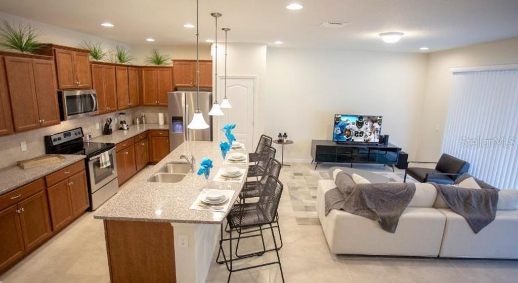 Photo of 8879 Geneve Court, Kissimmee, FL 34747 (MLS # O6376223)