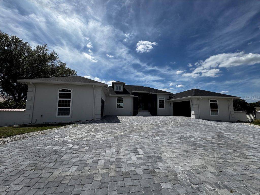 Photo of 10843 Lakeshore Drive, Clermont, FL 34711 (MLS # O6398625)
