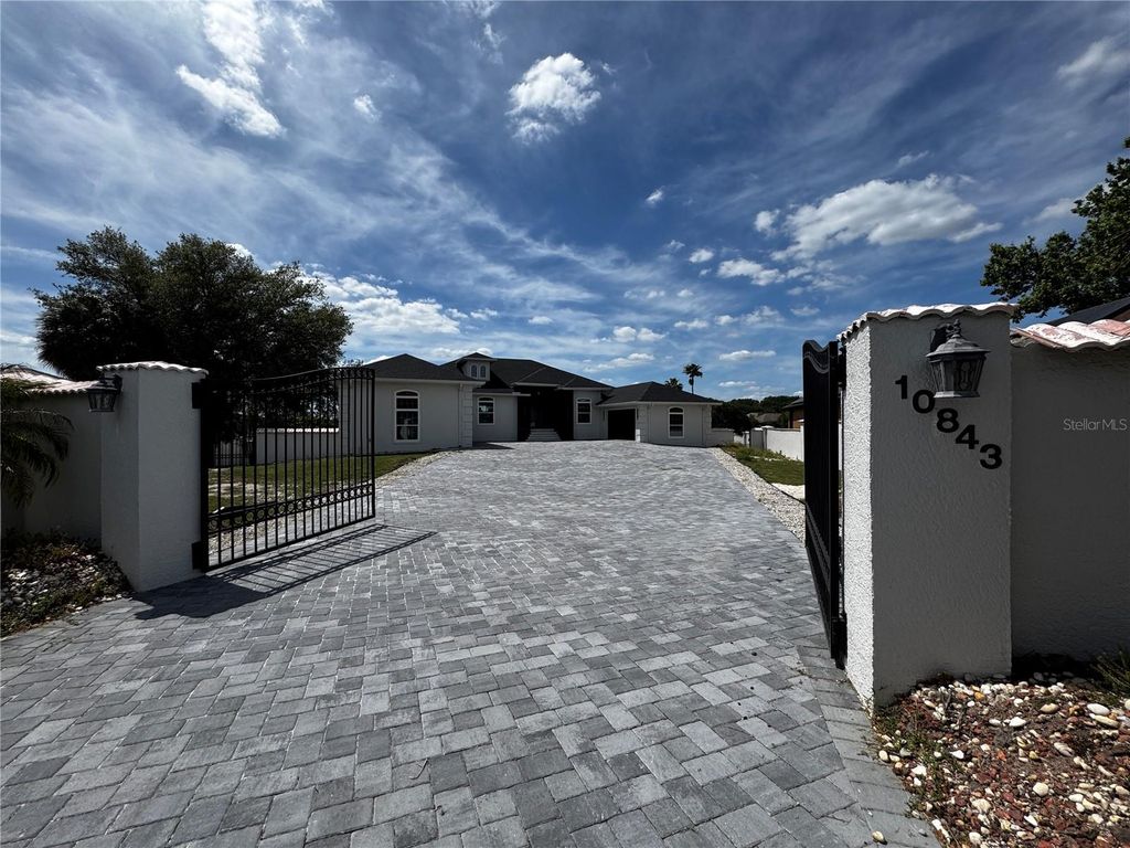 Photo of 10843 Lakeshore Drive, Clermont, FL 34711 (MLS # O6398625)