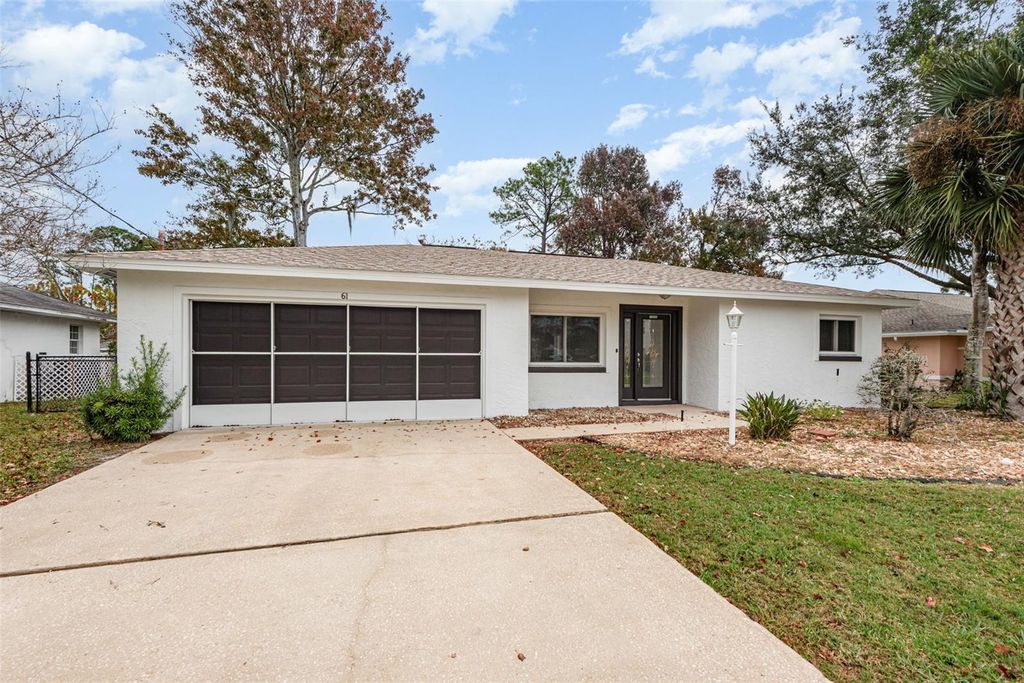 Photo of 61 Foxhall Lane, Palm Coast, FL 32137 (MLS # O6366259)