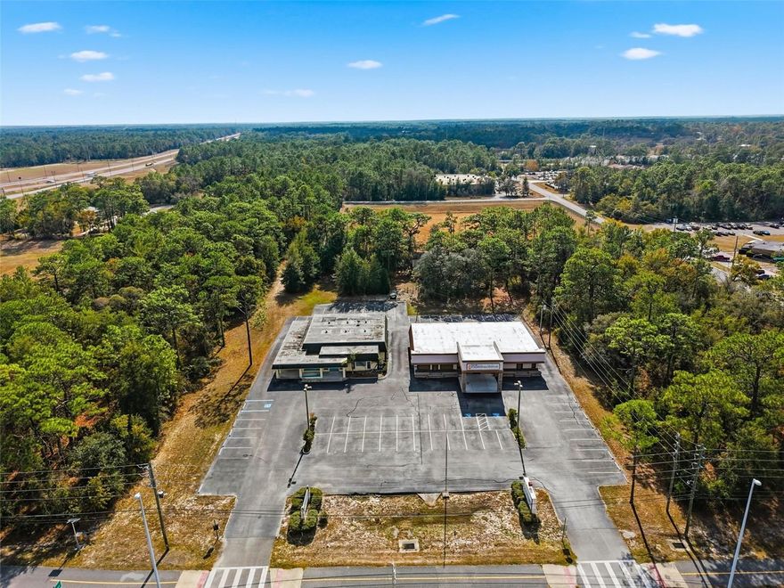 ***BEST LOCATION in Hernando County --- located at the SW corner of the Suncoast Parkway (589) and Cortez Blvd (State Road 50). If you are heading east on Cortez, this is the last property on the right before you pull onto the on ramp to go south on the parkway!! Public Water, Forced Sewer Main, and Teco Natural Gas...all 3 utilities are nearby to connect into.

2.2 ACRES!! AADT: 38,500 at last county and growing rapidly!! ZONED C-2!!  TWO BUILDINGS on the property currently. Tear them down or use them! Currently a medical cardiologist office! With You can do just about anything with it as C-2 already...gas station and convenience store, new medical facility not too far from Tampa General Hospital Brooksville, small car dealership, fast food or fast service like Quick Lube (large enough for 2 fast food/fast service companies, retail stores, restaurant, inside storage/outside storage, etc!! This parcel has TWO entrances off of Cortez to enter and exit the parking lots...this is HARD TO GET now as the county wants frontage roads unless you already have direct access onto to Cortez/50.