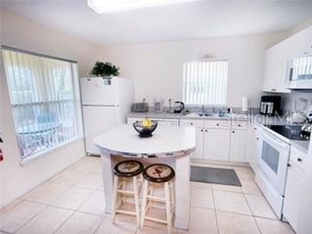 Photo of 2890 Club Cortile Circle, Kissimmee, FL 34746 (MLS # O6400811)