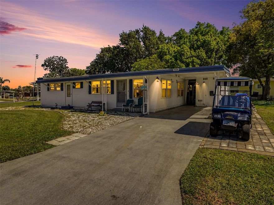 Located in a welcoming 55+ community in Tavares, this beautifully updated and truly move-in ready home is being sold fully furnished and fully equipped—and this goes far beyond furniture, as the sale also includes a boat, trailer, and golf cart, making it a true turnkey Florida lifestyle package. Remodeled in 2024, the home features new windows installed in 2025, new laminate flooring with reinforced subflooring for added stability, butcher block countertops, all new appliances, and fresh interior paint. Both bathrooms have been tastefully updated with walk-in showers, new shower inserts, and new vanities for easy, comfortable living. The primary bedroom offers three closets, while the guest bedroom includes double closets and built-in drawers, providing ample storage throughout. Additional living space includes a bright sunroom and two Florida room areas, perfect for relaxing or entertaining, plus a second refrigerator (approximately 3 years old) located in the Florida room for added convenience. The home also includes a covered carport with a laundry area in the attached shed. Major updates include a roof replaced in 2021 and a newer water heater. This property stands out with its included lifestyle extras: a 19-foot 1988 Bass Tracker boat with a 150 HP Evinrude, kept in the water year-round in a slip in the neighboring community of Imperial Terrace West (seller currently paying annual fee of $382), with trailer storage currently on the east side for $75 each year; a 4-passenger 2008 golf cart with full enclosure and plug-in charging; and two bicycles, all included in the sale. The low HOA fee of $50 each month, affordable utilities costs, and availability of RV and additional storage within the community make this an ideal low-maintenance option. This is a rare opportunity to own a fully furnished, well-updated home with boating and recreational amenities included, offering a seamless transition into relaxed Florida living.