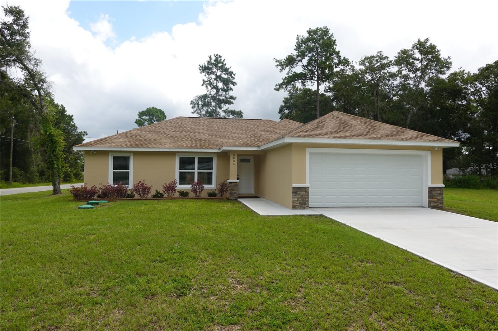 New Construction Home, Corner Lot, Prime location. This beautiful 3 bedroom, 2 bathroom home is move in ready and perfectly located just 10 minutes from the World Equestrian Center. Situated on a desirable corner lot, this home offers both comfort and convenience. Step inside to a bright open floor plan designed for modern living. The kitchen is equipped with brand new appliances and granite countertops with plenty of space to entertain. Throughout the home, you'll find scratch-resistant laminate flooring, combining style with durability. Additional features include an oversized master closet for all your wardrobe needs and window treatments already installed for your convenience. Don't miss your chance to own this gorgeous new build! Schedule your showing today.