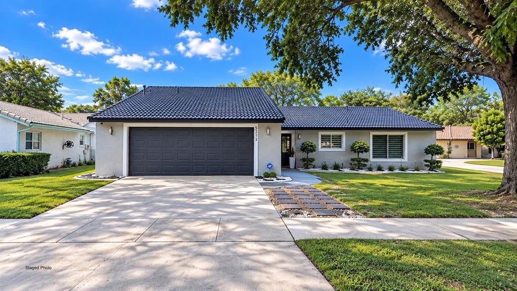 Photo of 5213 Wildflower Road, Orlando, FL 32821 (MLS # O6445765)