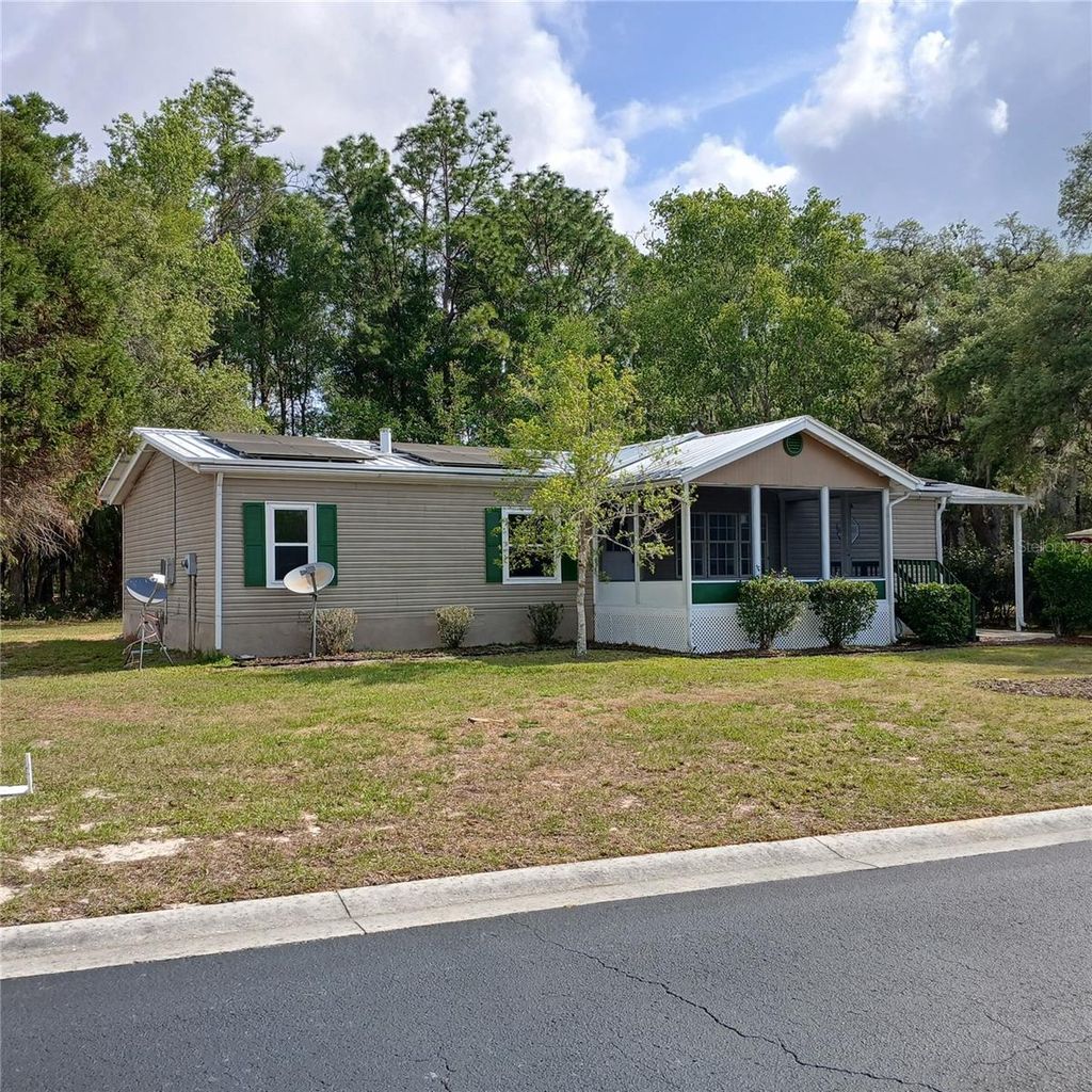 Photo of 7899 W Fostoria Drive, Dunnellon, FL 34433 (MLS # OM724123)