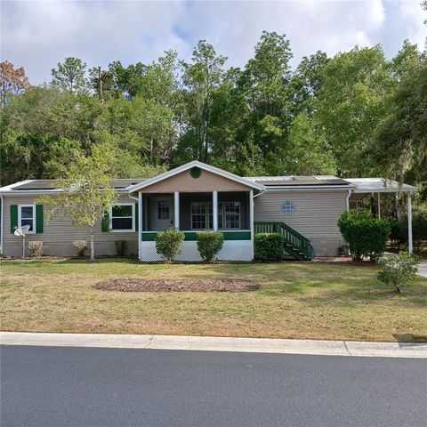 Photo of 7899 W Fostoria Drive, Dunnellon, FL 34433 (MLS # OM724123)