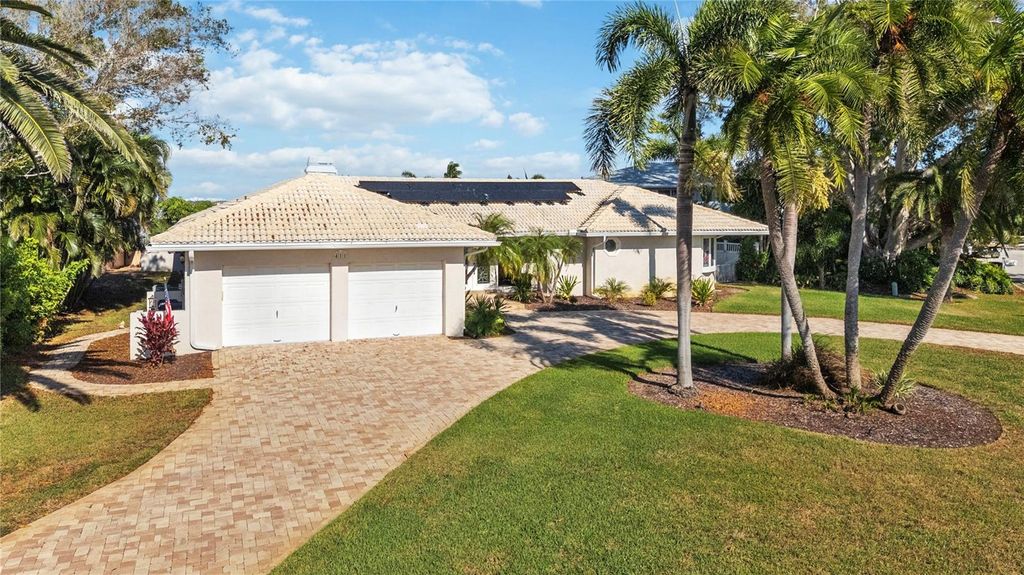 Photo of 411 Belle Isle Avenue, Belleair Beach, FL 33786 (MLS # TB8438769)