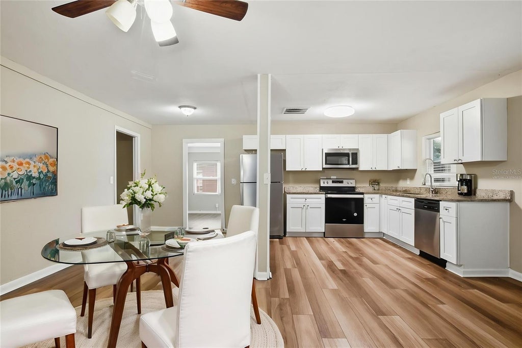Photo of 3604 Meadowbrook Avenue, Orlando, FL 32808 (MLS # O6438128)