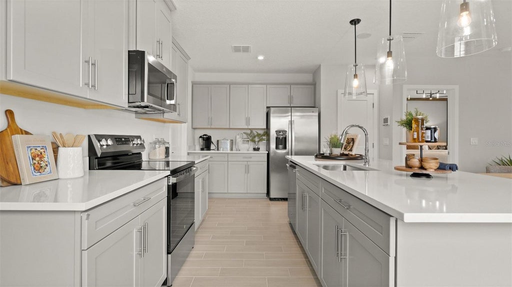 Photo of 3256 Cup Drive, Lakeland, FL 33803 (MLS # O6447328)