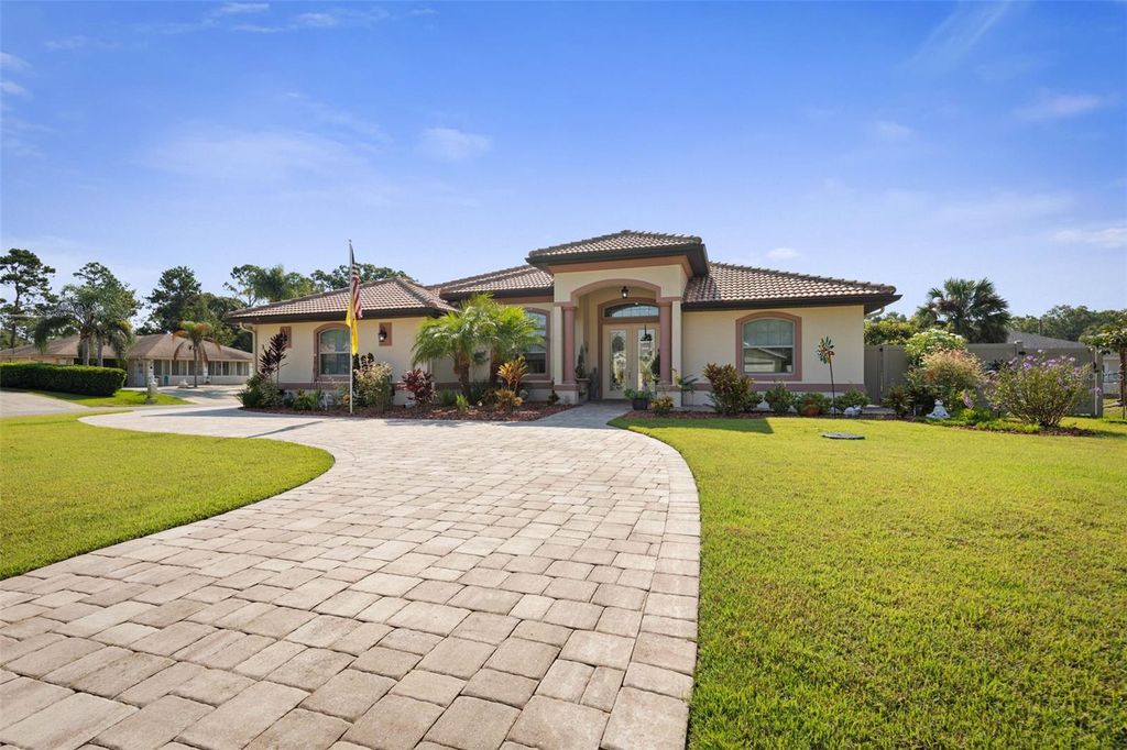 Photo of 3 Farmdale Lane, Palm Coast, FL 32137 (MLS # FC312114)