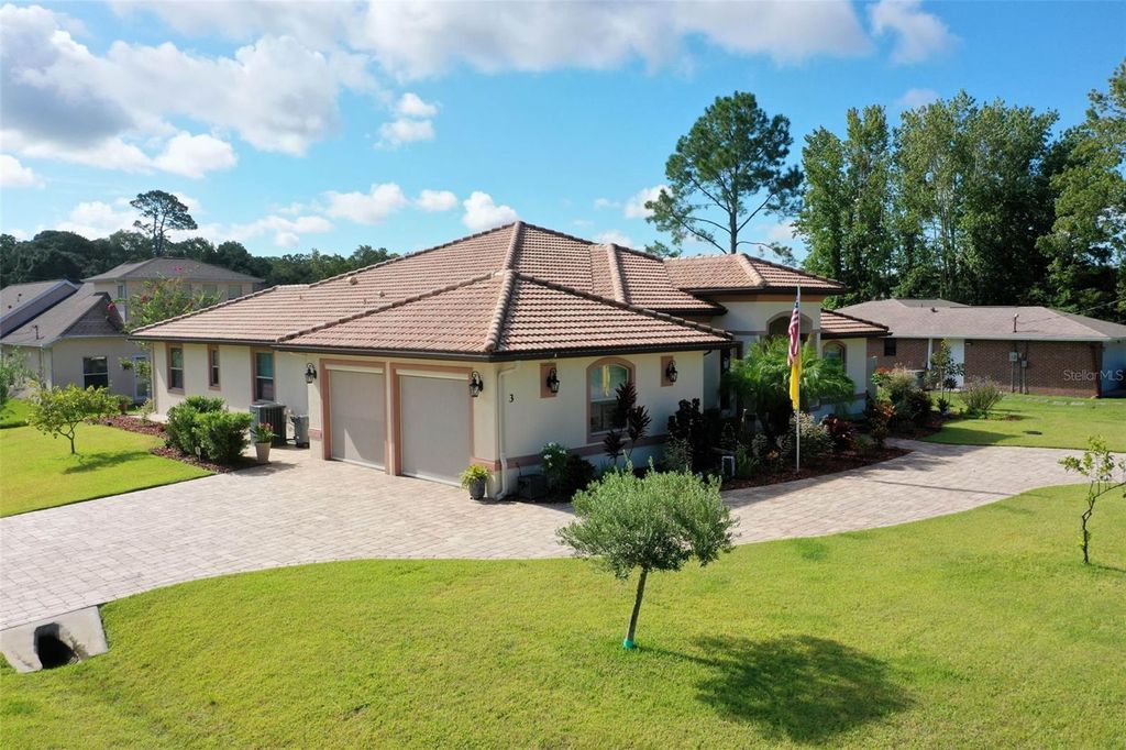 Photo of 3 Farmdale Lane, Palm Coast, FL 32137 (MLS # FC312114)