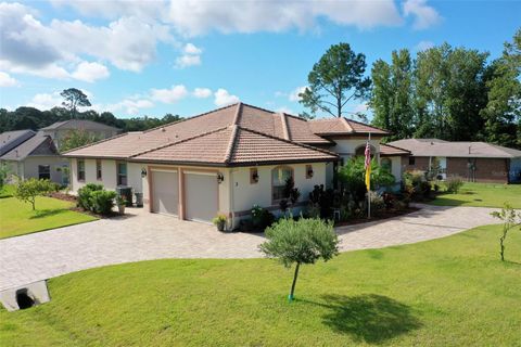 Photo of 3 Farmdale Lane, Palm Coast, FL 32137 (MLS # FC312114)