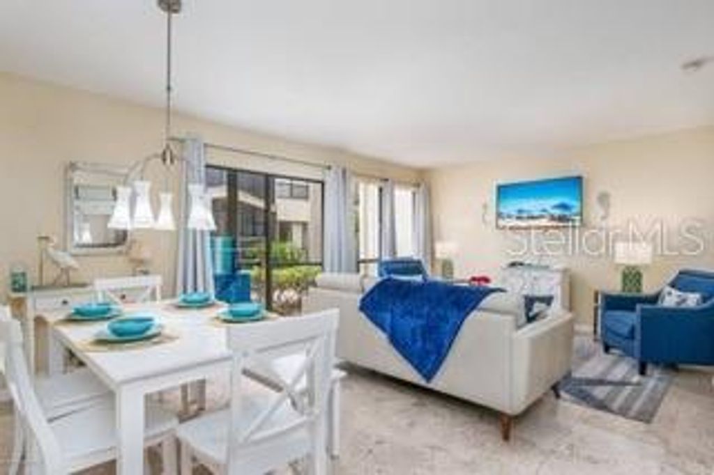 Photo of 6157 Midnight Pass Road #A51, Sarasota, FL 34242 (MLS # TB8415681)