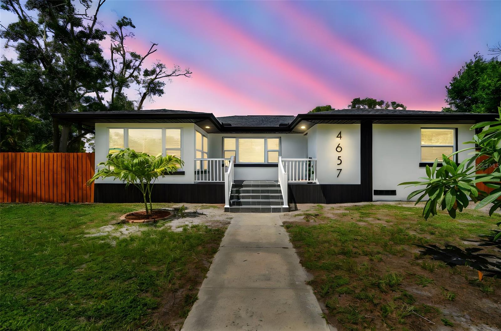 Welcome to this IMPECCABLY RENOVATED HOME in the heart of the desirable ST. PETE!!! NON-FLOOD ZONE!! Featuring 3 bedrooms, 3 bathrooms, and a 2-car garage detached on a corner lot. Ideal for first-time homebuyers, investors, or families looking to move into a fully updated home in a prime location. All bedrooms provide ample space and spacious walking closets, and the master bedroom has a stylish en-suite bathroom for more privacy and comfort. The kitchen is equipped with brand-new appliances, whit shaker cabinets, quartz countertops, tile backsplash, double stainless still sink with a garbage disposal and modern faucet, and an open-concept layout that flows seamlessly into the living areas. It also has a formal dining room. The detached garage, with rear entry access, features a full bathroom that adds extra convenience—perfect for outdoor gatherings, future pool plans, or simply rinsing off after a day at the beach without bringing sand and mess inside the home. Additionally, the property offers a separate and plenty of laundry room, also detached from the main residence, providing excellent organization and practicality. Recent updates include: BIG IMPROVEMENT IN PLUMBING AND ELECTRICITY, NEW ROOF, NEW HVAC SYSTEM, NEW ELECTRICAL PANEL, NEW INSULATION, NEW GARBAGE DISPOSAL, NEW WATER HEATER, NEW SMOKE DETECTORS, NEW LED LIGHTS AND CEILING FANS, NEW WATERPROOF LAMINATE FLOORING, NEW INTERIOR AND EXTERIOR DOORS, FULLY RENOVATED KITCHEN AND BATHROOMS, NEW FENCE AND NEWLY INSTALLED PAVERS IN THE BACKYARD. This property is perfectly situated in a prime location, just 12 minutes from the vibrant Downtown St. Pete and the world-famous St. Pete Beach, with easy access to top-rated restaurants, shopping, I-275, and less than 30 minutes from Tampa International Airport. Opportunities like this don't last long—schedule your showing today and don't miss the chance to make it yours!