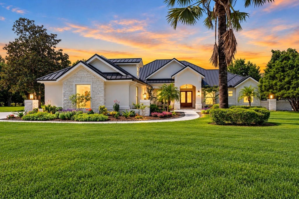 Photo of 11526 Trotting Down Drive, Odessa, FL 33556 (MLS # TB8556909)