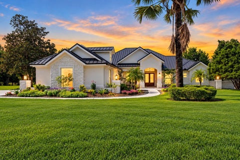Photo of 11526 Trotting Down Drive, Odessa, FL 33556 (MLS # TB8556909)