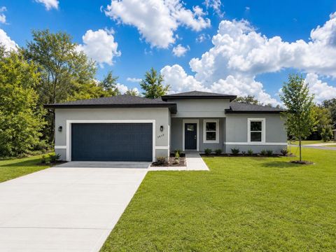 Photo of 3036 W Arkon Place, Dunnellon, FL 34433 (MLS # O6406457)