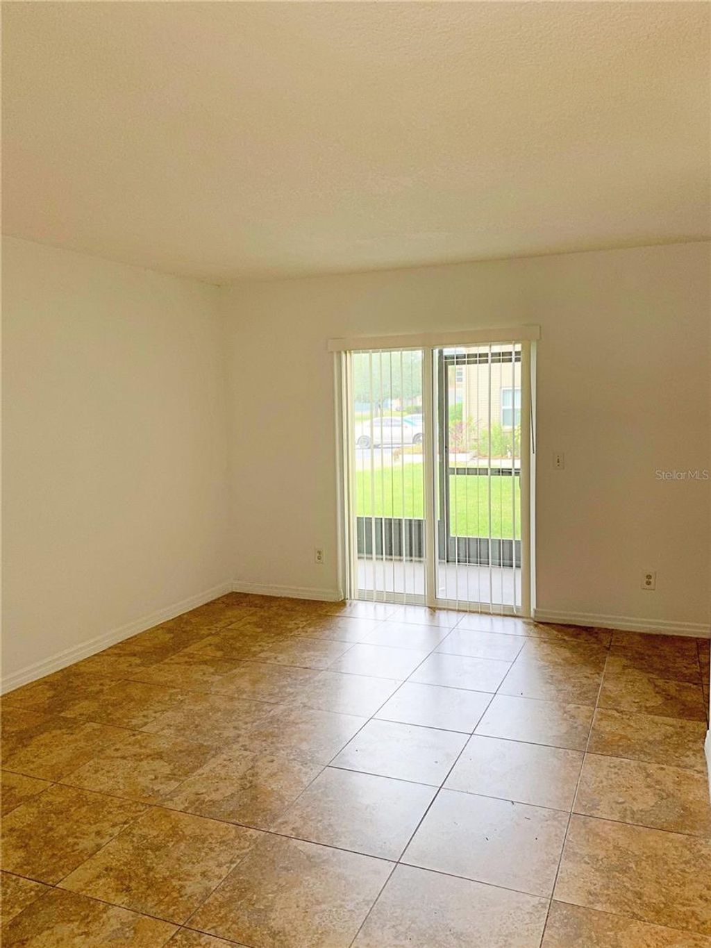 Photo of 9800 Turf Way #2, Orlando, FL 32837 (MLS # S5140346)