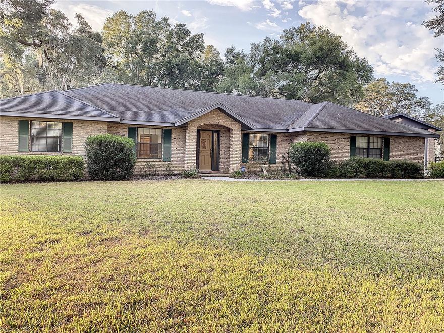 Welcome to your dream retreat! This inviting home eagerly awaits you, and it's perfect for those who love to bring their toys along for the ride. Imagine having a 24 X 40 RV garage, an additional detached 16 X 37 garage (currently a charming workshop), and a convenient attached garage measuring 21 X 26 – all at your disposal. Nestled in a wonderfully private location, this residence opens its doors to a lifestyle of leisure and relaxation. Picture yourself unwinding by the inviting inground pool or spending delightful evenings on your screened lanai. Every corner of this property has been designed with your comfort in mind. Step inside, and you'll discover a haven of spaciousness. The living room welcomes you with a cozy fireplace and a lofty cathedral ceiling, creating a warm and inviting atmosphere. A dedicated dining room, a convenient office space, and a Florida room with a delightful view of the pool offer a variety of spaces to suit your lifestyle. You'll find elegant tile throughout, enhancing the flow of the home, while the bedrooms offer a plush carpet for added comfort. Outside, the property is adorned with lush landscaping, creating a picturesque backdrop for your daily adventures. A three-board fence encircles the property, providing both a sense of security and a charming aesthetic. This home is not just a residence; it's an invitation to a lifestyle where every day feels like a vacation. Come and experience the warmth and welcoming embrace of this property, where the possibilities are as vast as the sky. Your dream home is ready – bring your toys and make it your own!