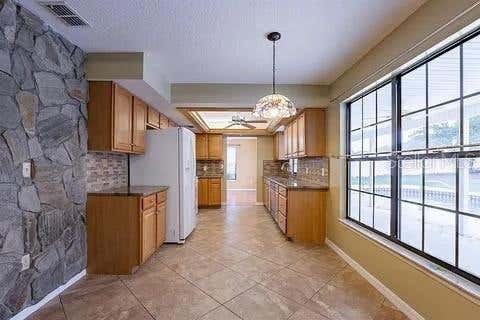 Photo of 7528 River Country Drive, Weeki Wachee, FL 34607 (MLS # A4697726)