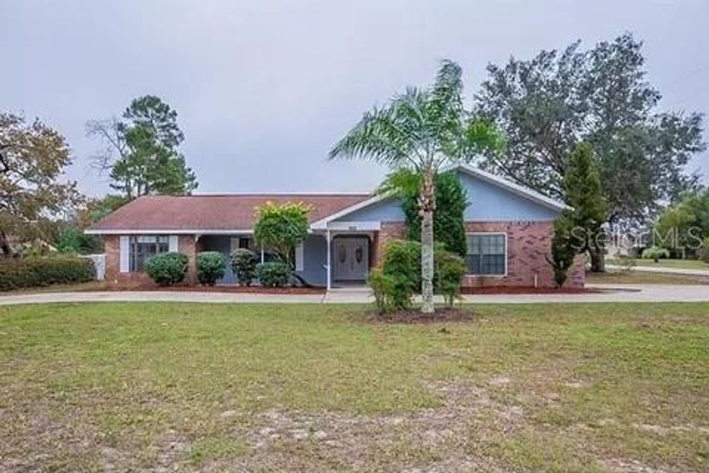 Photo of 7528 River Country Drive, Weeki Wachee, FL 34607 (MLS # A4697726)