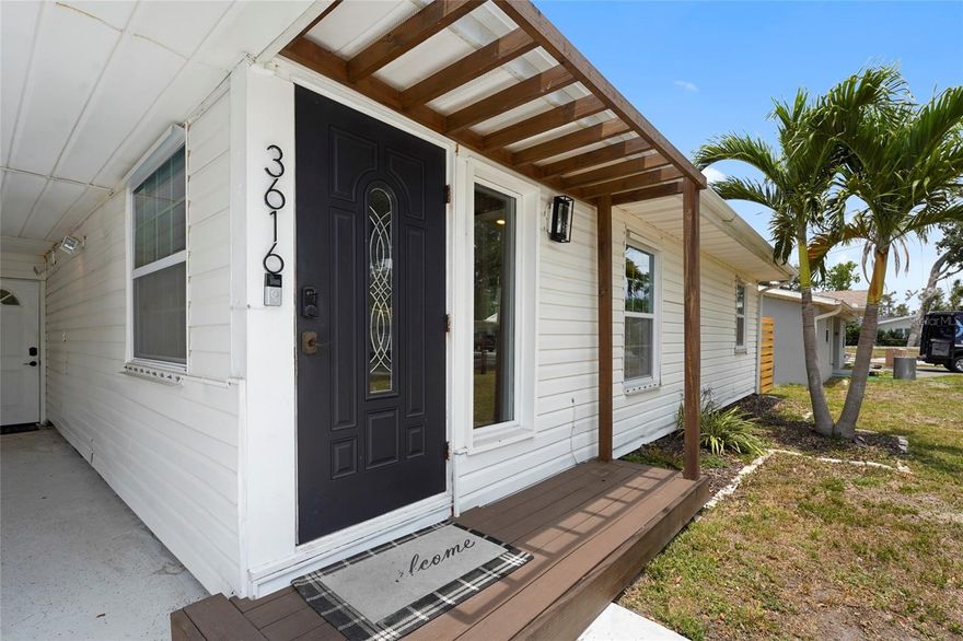 Welcome to this delightful Sarasota gem, tucked away on a quiet side street just off Bee Ridge, where convenience meets comfort. This charming 2-bedroom, 2-bath home offers a bright and airy interior with a soft, neutral palette that creates an inviting atmosphere from the moment you walk in. The spacious floor plan is filled with natural light, while the beautifully updated kitchen features gleaming stainless steel appliances, granite countertops, crisp white cabinetry, and a wine fridge ready for your favorite vintages. The island with breakfast bar is the perfect spot to catch up with the chef or enjoy a casual meal. A versatile bonus room just off the kitchen, complete with its own mini-split system, opens to the fully fenced backyard where a cozy patio and firepit await—perfect for relaxing evenings or entertaining guests. The laundry and utility room are conveniently located inside the bonus space, providing ample storage and functionality. Additional features include a new septic system and drainage field (2022), a new water heater (2024), hurricane shutters, a carport, and an extended driveway with room for multiple vehicles or even a boat. Whether you’re looking for a full-time residence or the perfect seasonal retreat, this home’s location can’t be beat—you’re just minutes to the beach, downtown Sarasota, shopping, dining, and the interstate. Zoned for top rated schools, this is your chance to experience this warm and welcoming home—schedule your showing today!