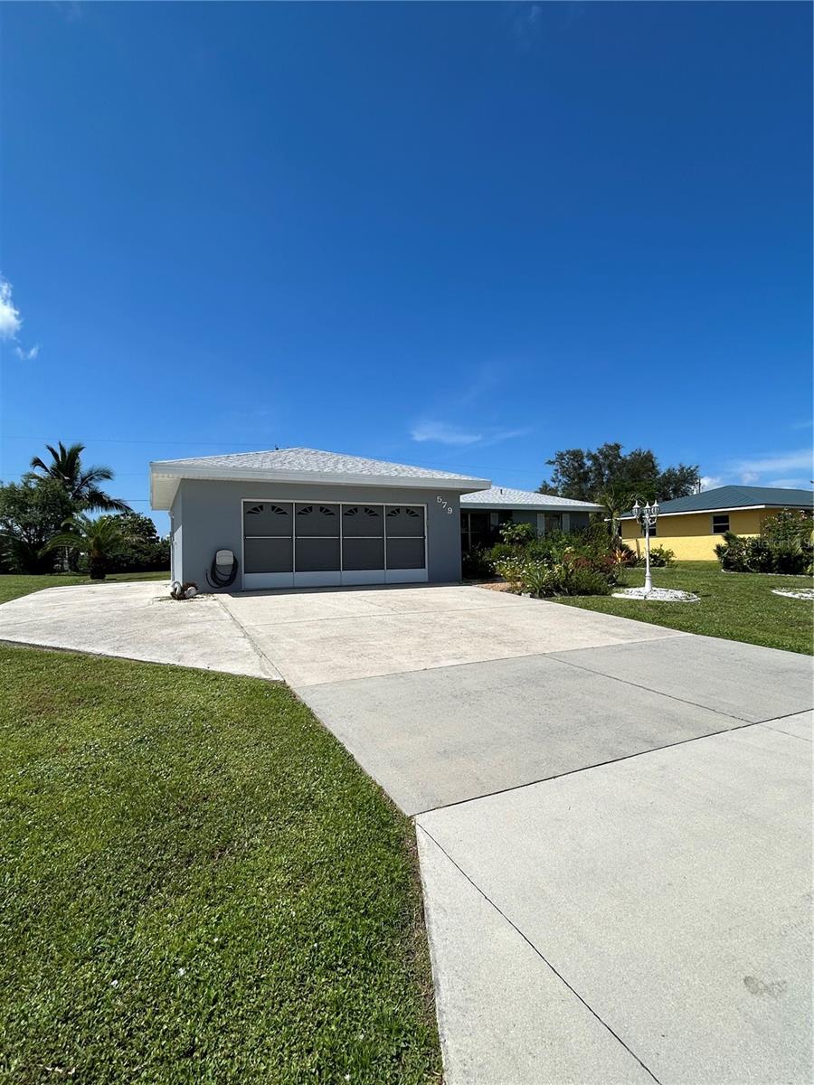 Move in ready 2 bedroom 2 bath pool home sits on a quiet street. This well maintained home has 2 large bedrooms, open living/dining area, spacious kitchen with granite counter tops and plenty of cabinets and a separate pantry. The master bedroom has his/her walk in closets. Tile throughout the house except for the spare bedroom. Large covered deck by the pool makes it a great area for family and friends pool parties. Oversized 2 car garage. Plenty of room for parking boats and trailers with a driveway running along side of house. Furniture can stay with the house. Close to shopping and hospitals. Great starter home, rental or seasonal. Attic insulation was replaced in 2023 keeping it cool inside. Roof replaced 2023. Interior and exterior painted 2024. Hot water heater replaced in 2025. Hidden gem ready for a new owner. Call for a showing today!